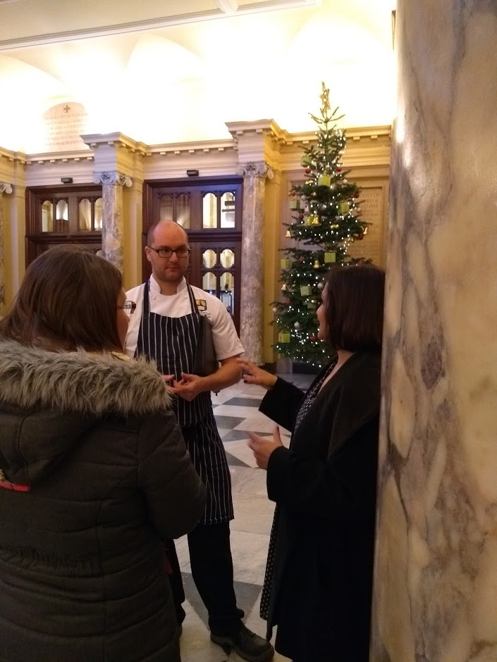 Event organisers chatting to chef