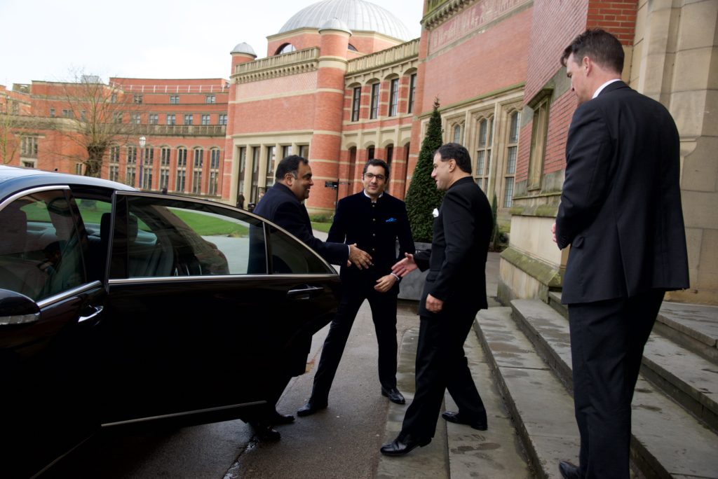 Event attendees being welcomed