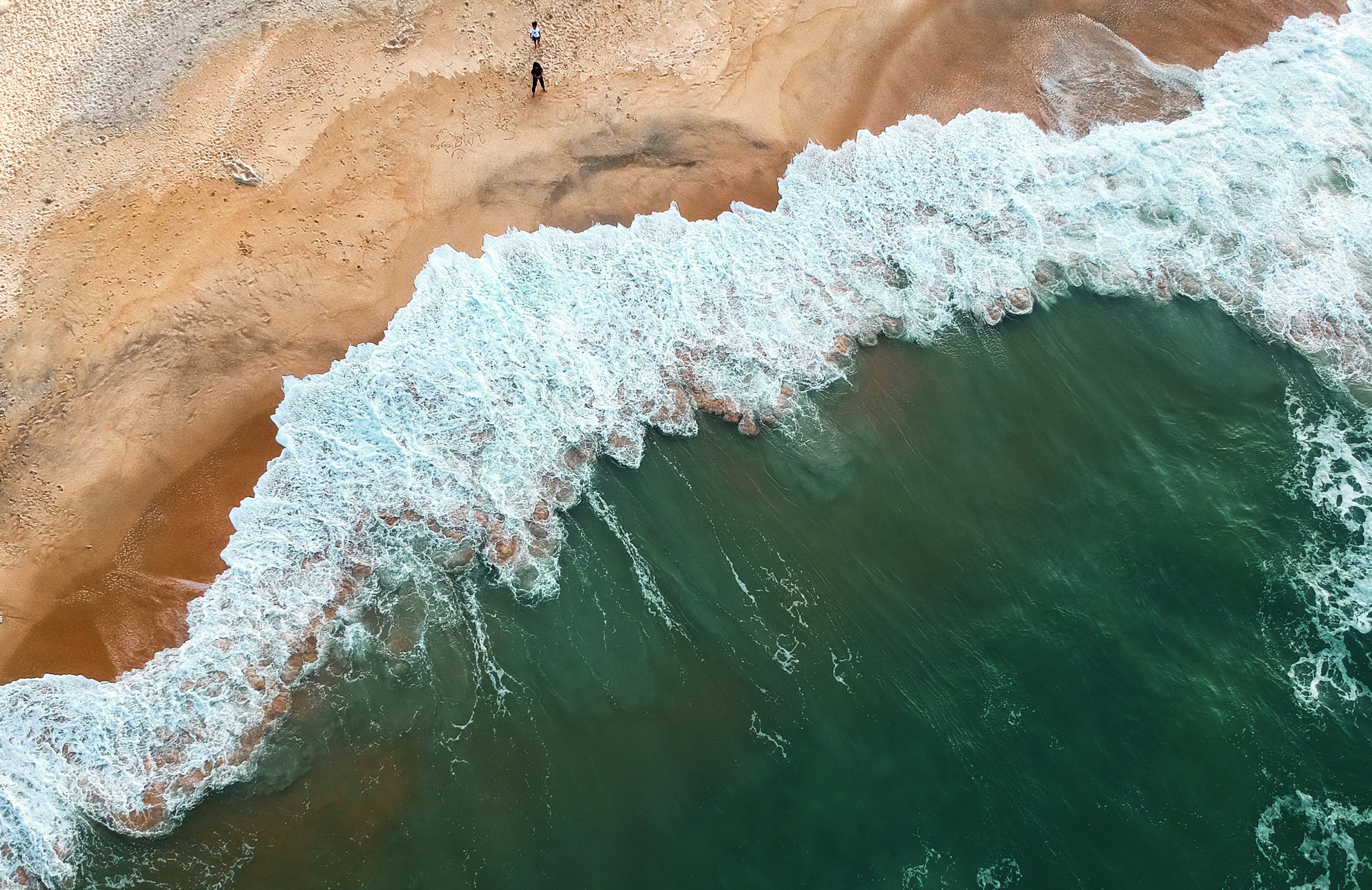 Tide rolling over beach