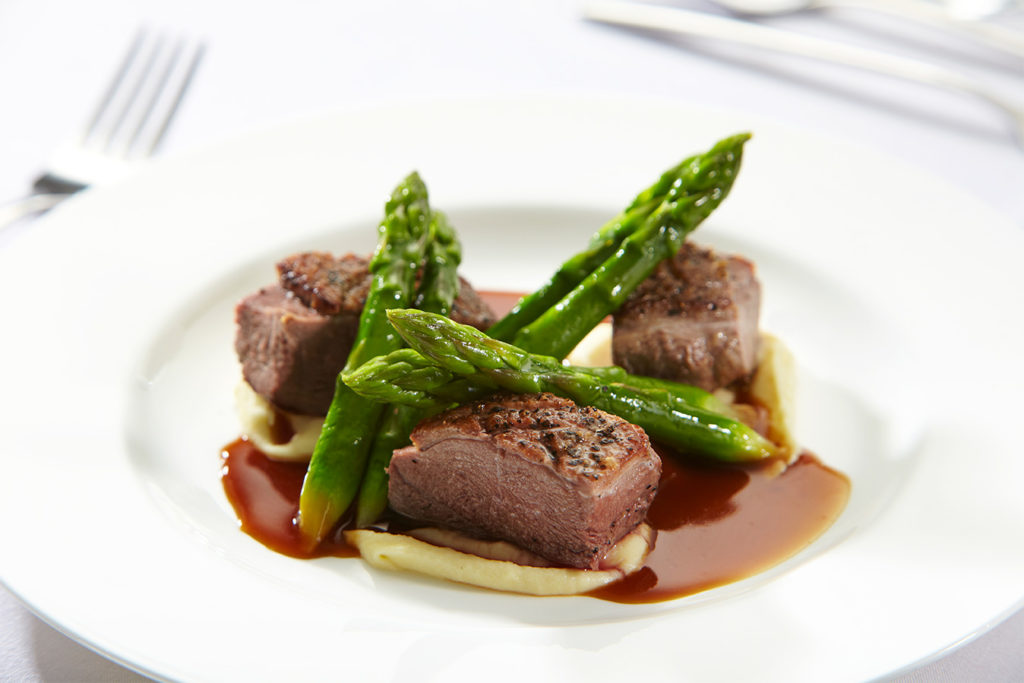 Plate of duck and asparagus