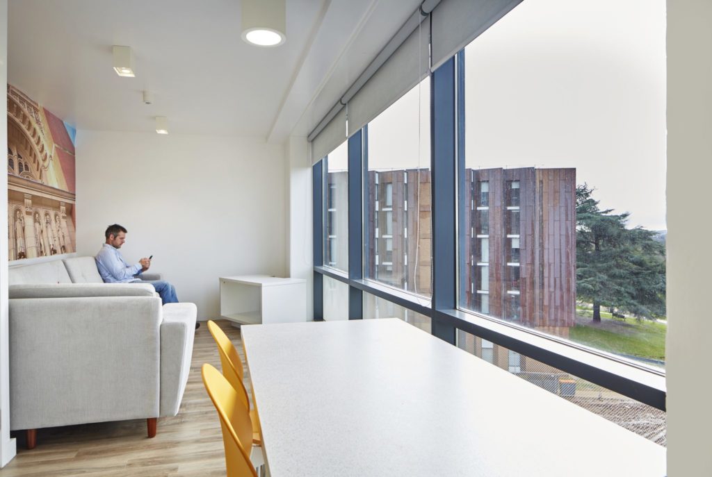 Person sitting in flat