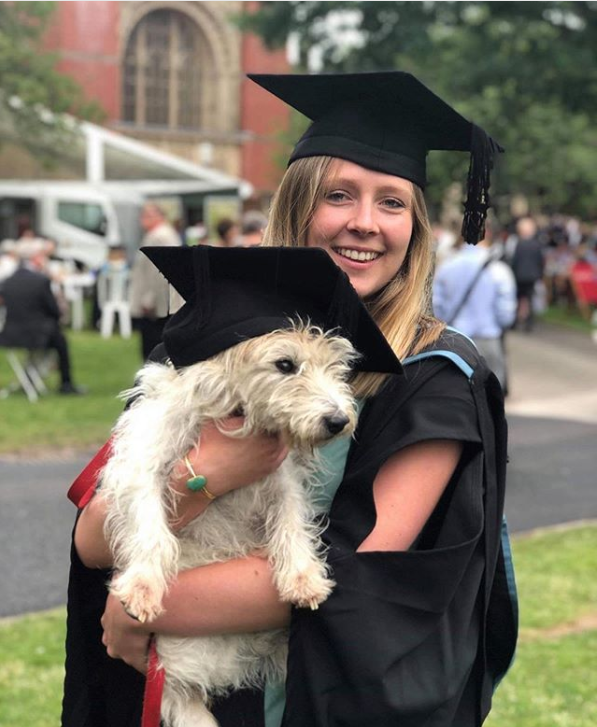 Graduate Isabelle with her dog Charlie