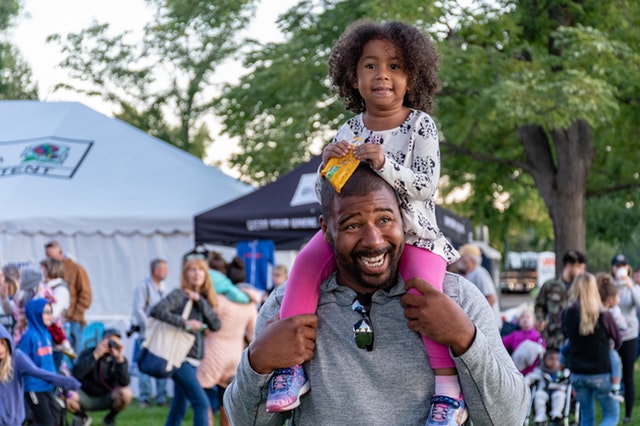 event adult carrying child