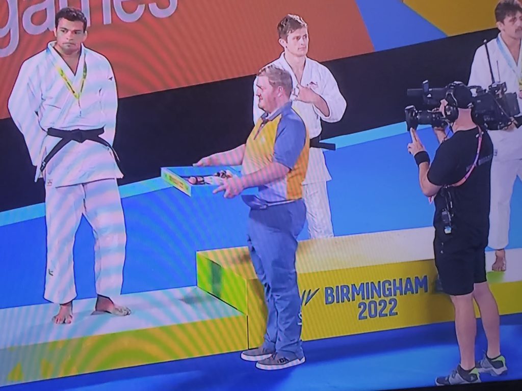 Paul at Judo ceremony on TV.