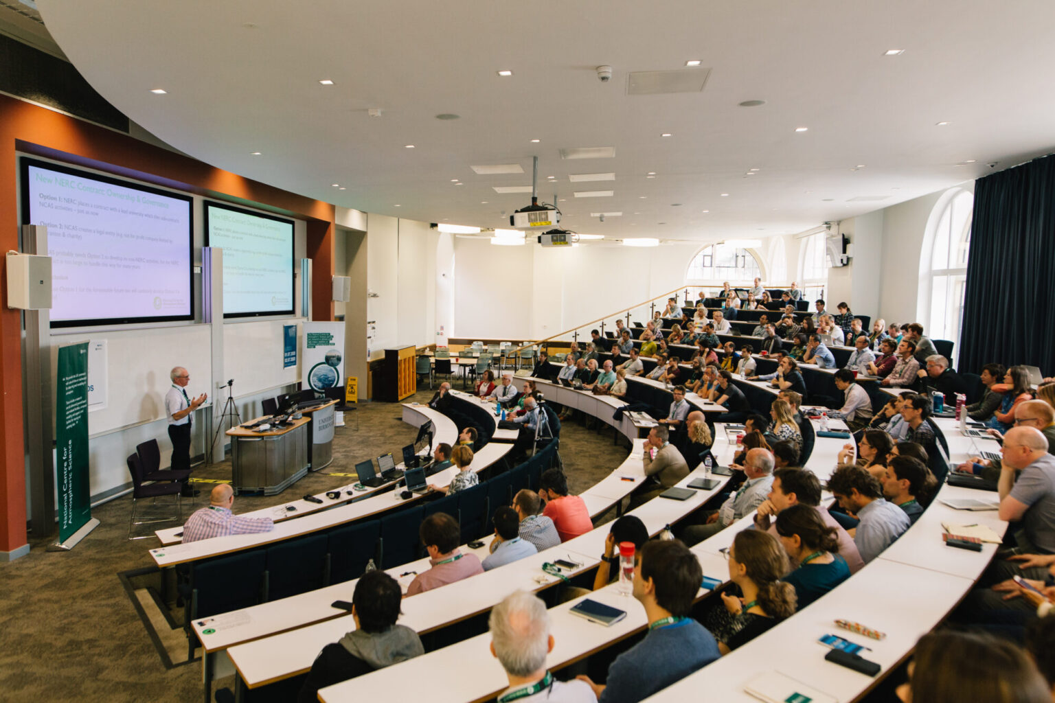 A group of people in a lecture theatre