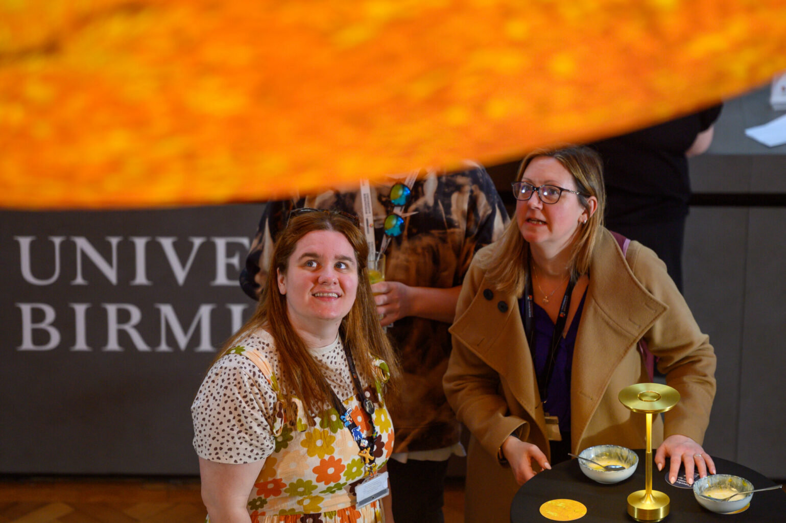 Two guests looking at Helios